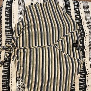 The brand is Polly & Esther, and it is a size Large.